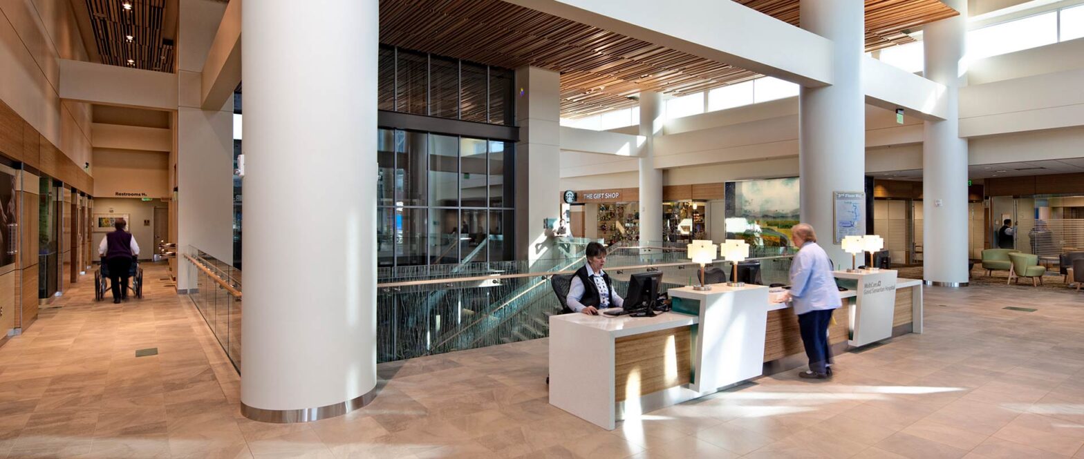 Double-height lobby with reception desk