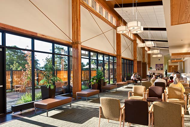 Double-height lobby looking out to parking lot