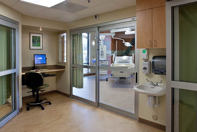 Hallway looking into patient room