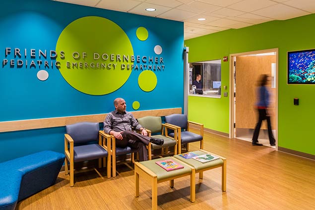 Man waiting at pediatric ER waiting room