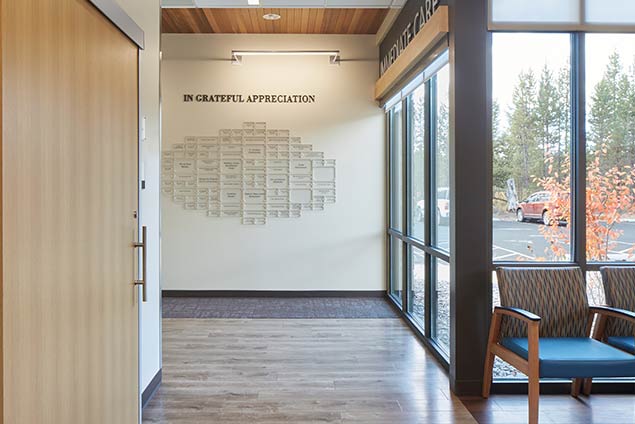 Waiting room with donor wall in background