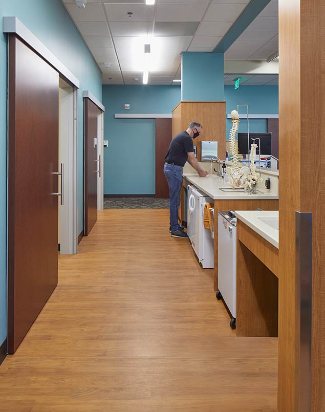 Man at counter washing hands