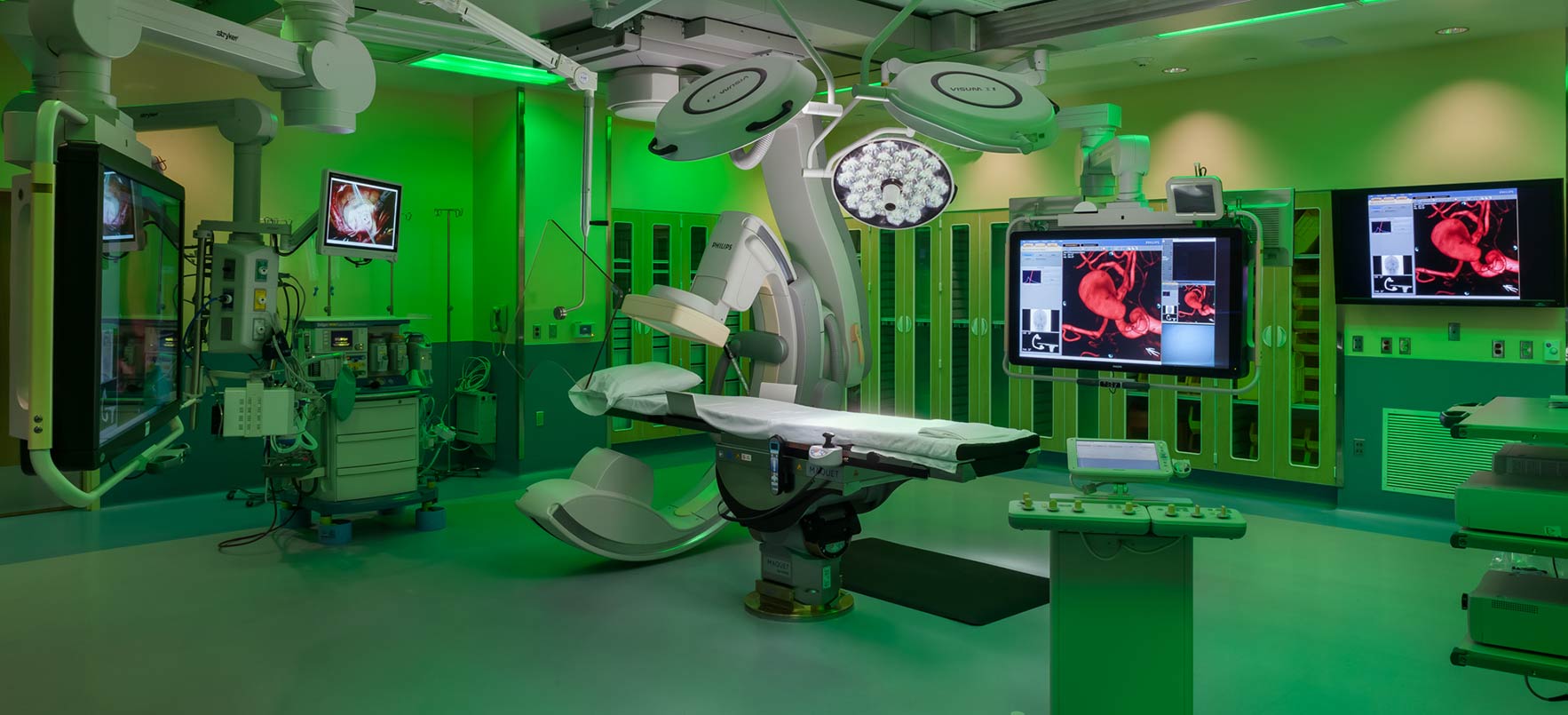 Hybrid operating room with green lighting