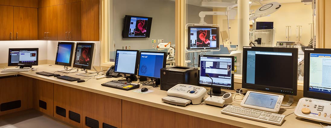 Row of computers behind nursing station