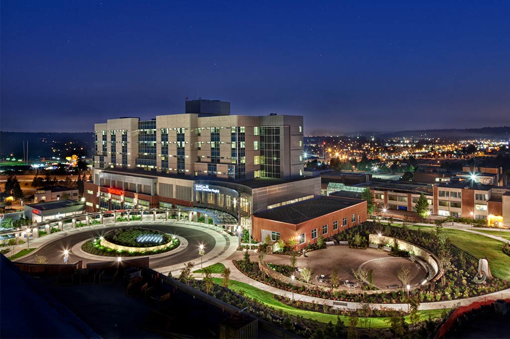 Nighttime aerial photo of a large hospital campus 