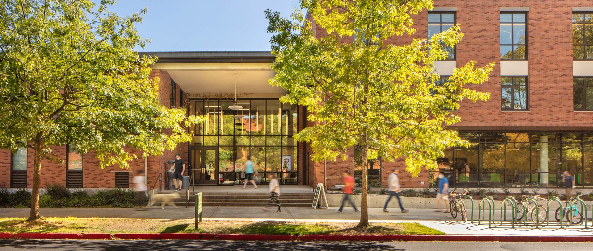 Exterior of building looking at entryway and sidewalk